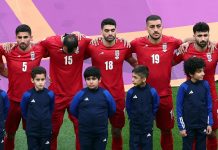 Iran players refuse to sing national anthem at football world cup